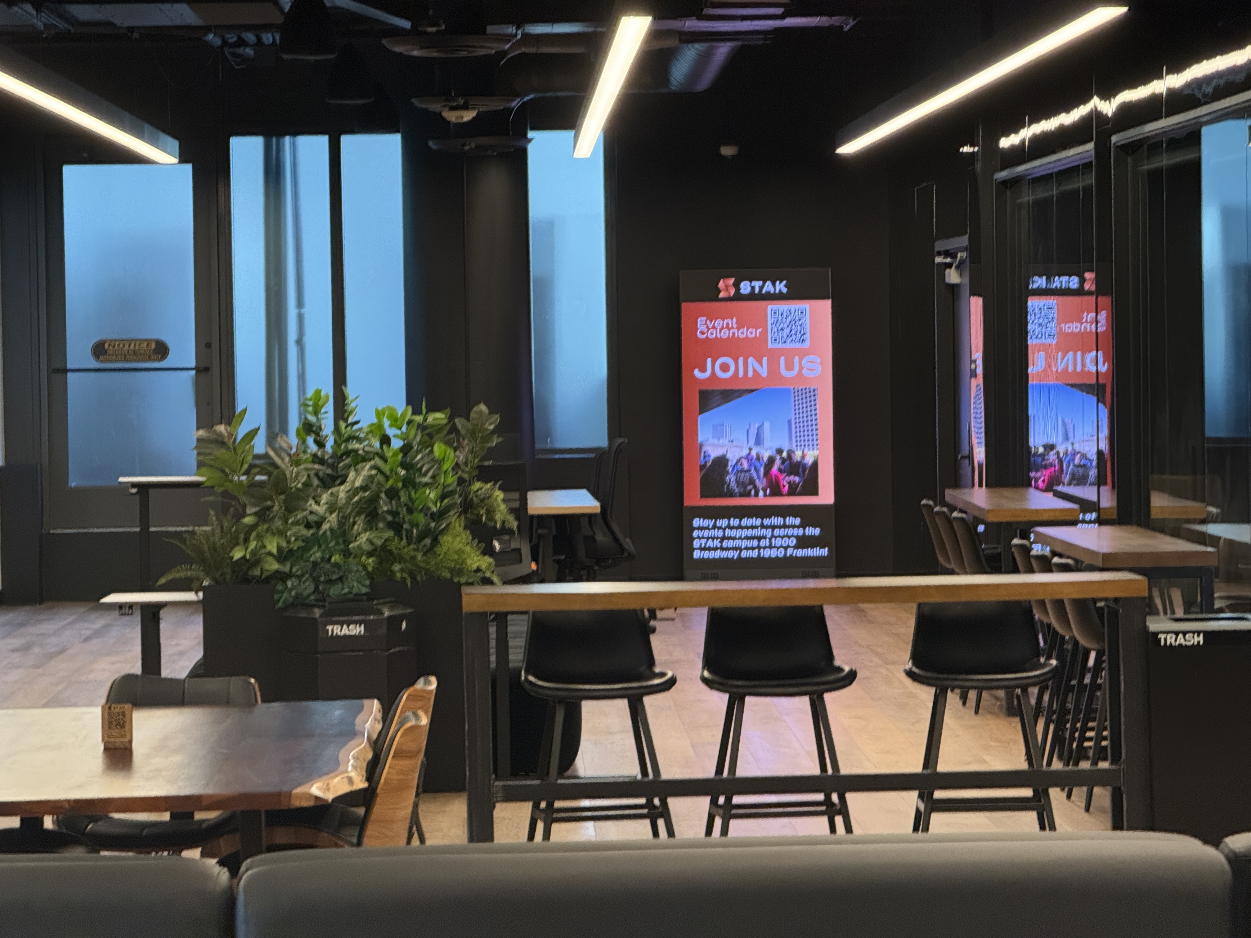 STAK Space coworking lounge with digital signage